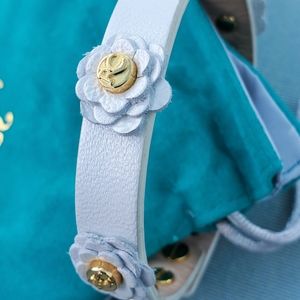 Rustic cuff bracelet, white with flowers.